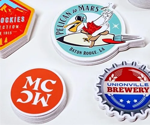 Custom die-cut vinyl stickers contour cut to logo shapes in full color