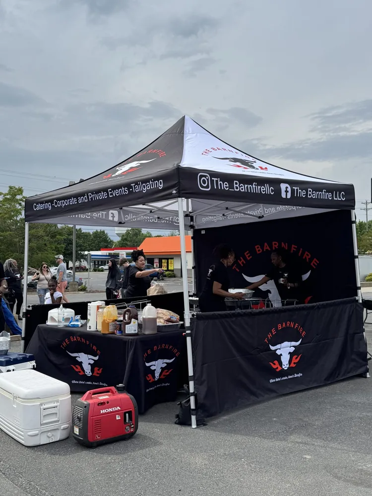 Custom full-color branded canopy tent at an outdoor event